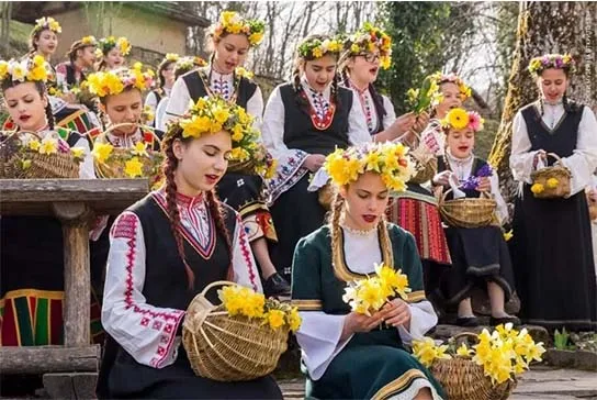 Aratlii Bulgarian folk dancers performing in traditional costumes