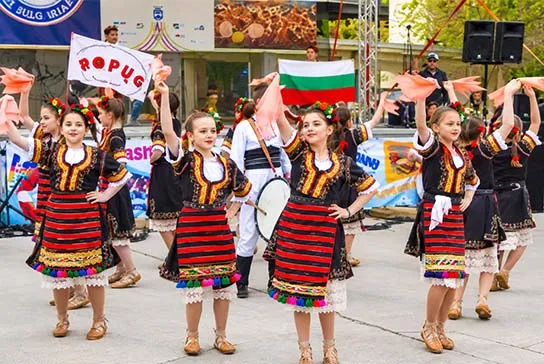 Lakatniche children's folk dance group from Bulgaria performing traditional Bulgarian dance